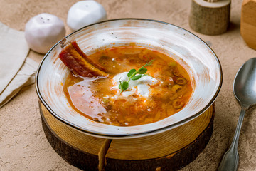 Meat Solyanka soup on beautiful plate