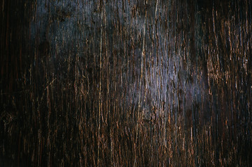 dark wooden background with scratches. Textured backing of the table. Place for text. Template for design and inscriptions.