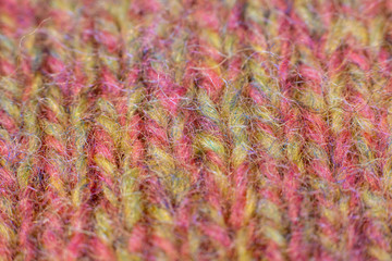 Pink and green wool knit close up