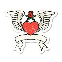 grunge sticker with banner of a heart with wings