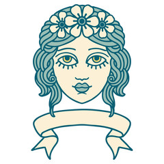 tattoo with banner of female face with crown of flowers