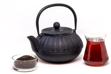 Foto op Aluminium Black Tea in an Asian Style Teapot © Bartu