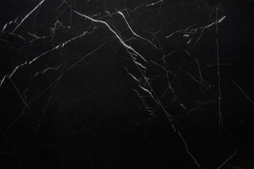 black, dark floor and wall coverings in the form of natural stone, marble for facing, landscape, interior.