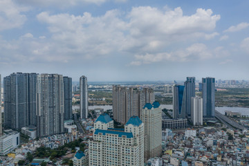 Aerial view of ultra modern high rise developments in Ho Chi Minh City, Vietnam with vieew to Saigon River