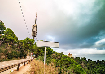 Obraz premium The Collserola Tower in Barcelona is an antenna visible from all over the city