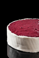 Berry top cake. Art of sweets. Content for pastry shop and bakery. Traditional culinary. Black backdrop