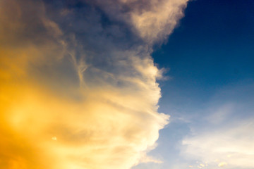 Naklejka na ściany i meble Clouds and the sky while sunset