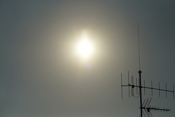 Sunset and antenna broadcasting air