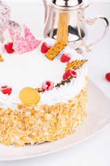 Air cake with nut chips of almonds with fresh raspberry and chocolate