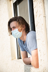 Medical mask worn on a young man