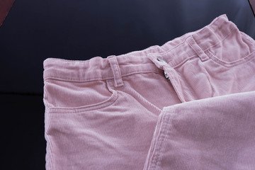 top of pink women's trousers near