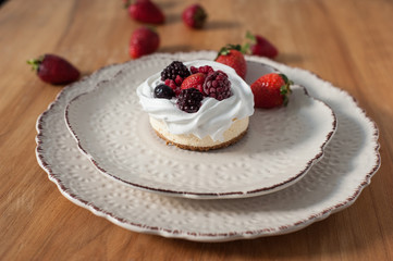 red fruit cheesecake on ceramic plate