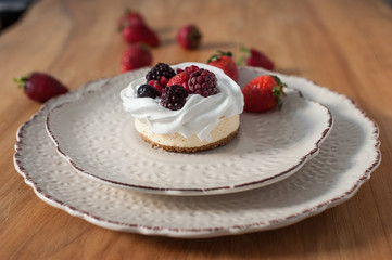 red fruit cheesecake on ceramic plate