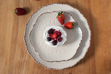 red fruit cheesecake on ceramic plate