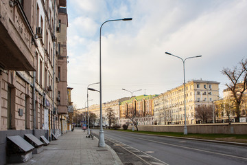 Russia, Moscow, April 2020. Empty streets of the city. Quarantine in Moscow. Rare passers-by, a small number of cars on the road. Spring day.