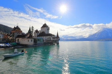 Oberhofen Castle from Lake Thun. Oberhofen town is located on the northern shore of Lake Thun. Switzerland, Europe.