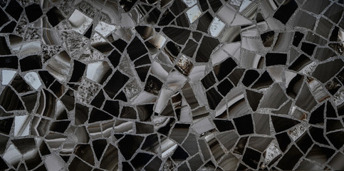 gray, black, transparent, silver mosaic of fragments of stone for decorative design of walls