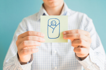 Picture icon newborn in hand