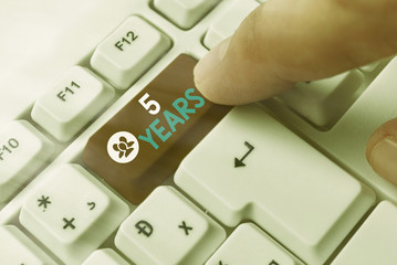 Writing note showing 5 Years. Business concept for Remembering or honoring special day for being 10 years in existence
