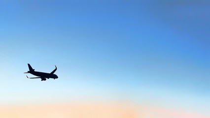 A large air plane flying in the sky
