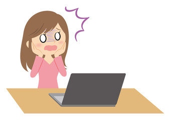 リモートワークの女性　ショック　ノートパソコン