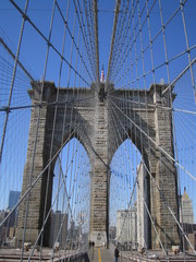 Low Angle View Of Brooklyn Bridge Against Blue Sky