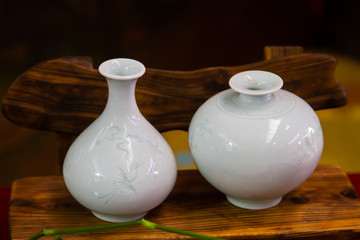 Fototapeta na wymiar white ceramic vase close up