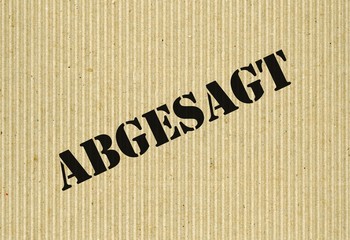 Abgesagt (Cancelled) on cardboard