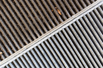 Old and new cabin filter close-up. Comparison of dirty and clean filter.