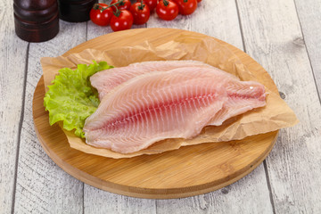 Raw tilapia fish