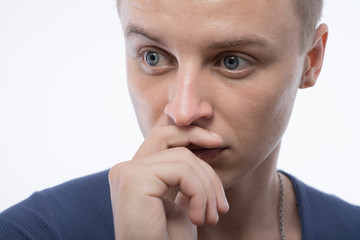 Portrait of handsome young thoughtful man