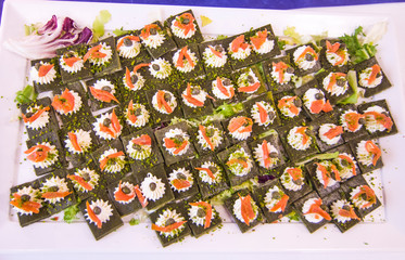 sandwiches with salmon, oil and lemon