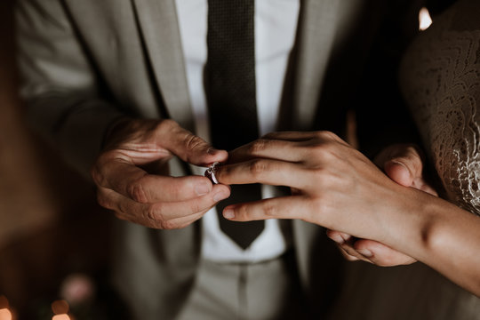 Hands with wedding ring