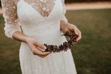 Bride with headdress in hands