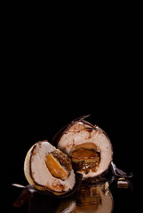 Pie nut, with nut cream, chocolate glaze sprinkled with gold