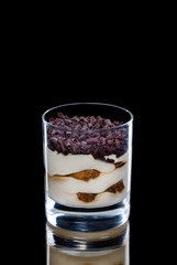 Tiramisu with cookies, cheese cream and chocolate crumb