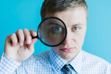 businessman with a magnifying glass