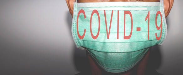 doctor wears a protective mask for the face Virus mask concept Coronavirus.Coronavirus COVID-19 - 2019-nCoV

