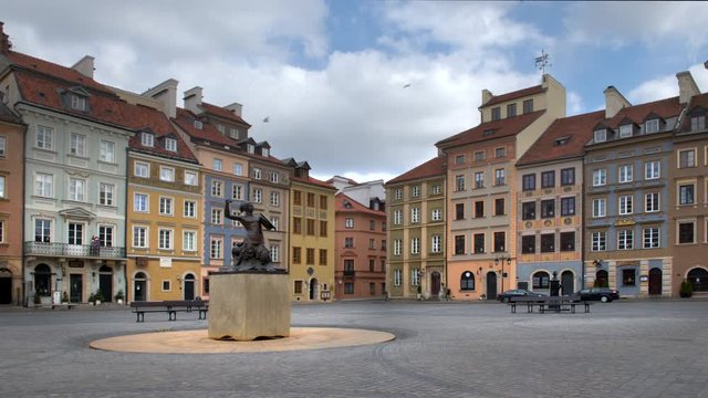 WARSAW, POLAND - MARCH 23, 2020: Empty Old Town square in Warsaw during COVID-19 epidemic time. Usually this place is filled with people and vibrant life.