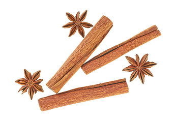 Cinnamon sticks and star anise spice isolated on a white background, top view.