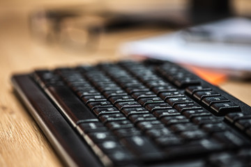 female hand typing text on laptop