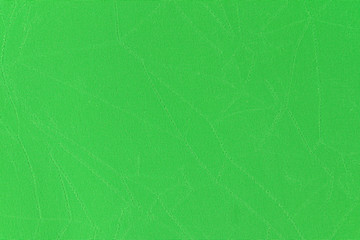 Green background. Green Synthetic fabric texture, background. Green fabric.