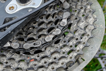 close up of gears on a bicycle wheel