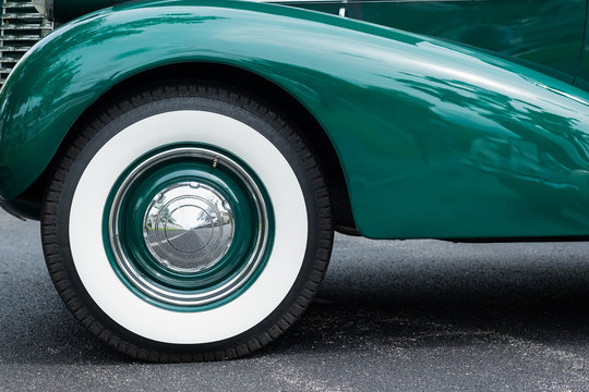Front fender and whitewall tire on classic car