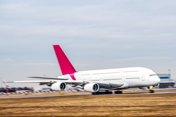 Aircraft take-off into the sky against the background of the airport . passenger traffic