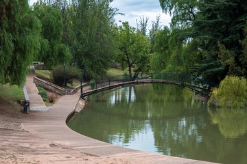 Bridge over river in park at Mendoza