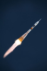 Rocket takes off into the sky. The elements of this image furnished by NASA.