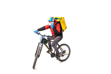 Too much orders. Contacless delivery service during quarantine. Man delivers food during isolation, wearing gloves and face mask. Taking pizza on bike isolated on white background. Safety. Hurrying up