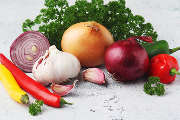 Different spices: onion. garlic, parsley and pepper