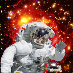 Obraz na płótnie Canvas Astronaut and galaxy on the backdrop. The elements of this image furnished by NASA.